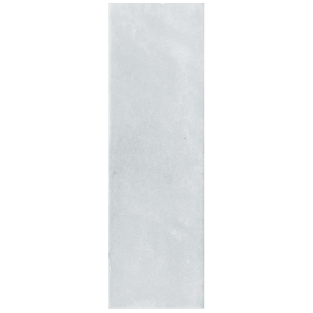 Candy 2x6 inch porcelain tile in a compact, glossy surface with a refined vintage brick aesthetic.