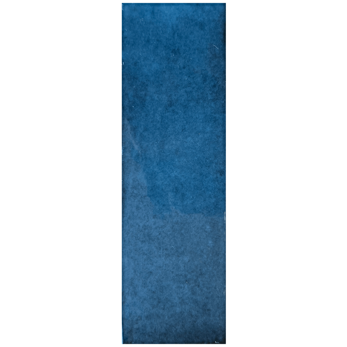 Candy 2x6" porcelain tile in a rich blue hue, featuring a glossy texture and vintage brick-inspired design.