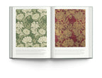Two-page spread showcasing William Morris wallpaper designs, featuring floral patterns in green and red hues.