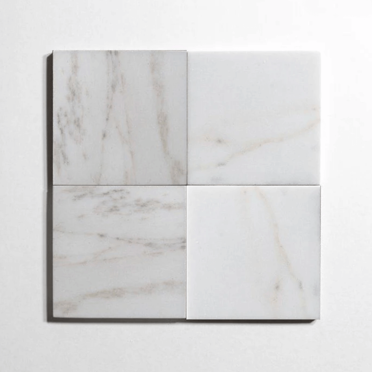 Colorado Calacatta marble tile, white with warm gold-gray veining, 6x6 inch