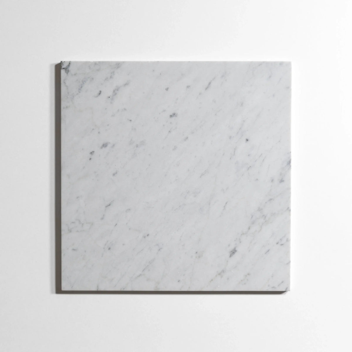 Venatino Carrara marble tile, white with soft gray veining, 12x12 inch