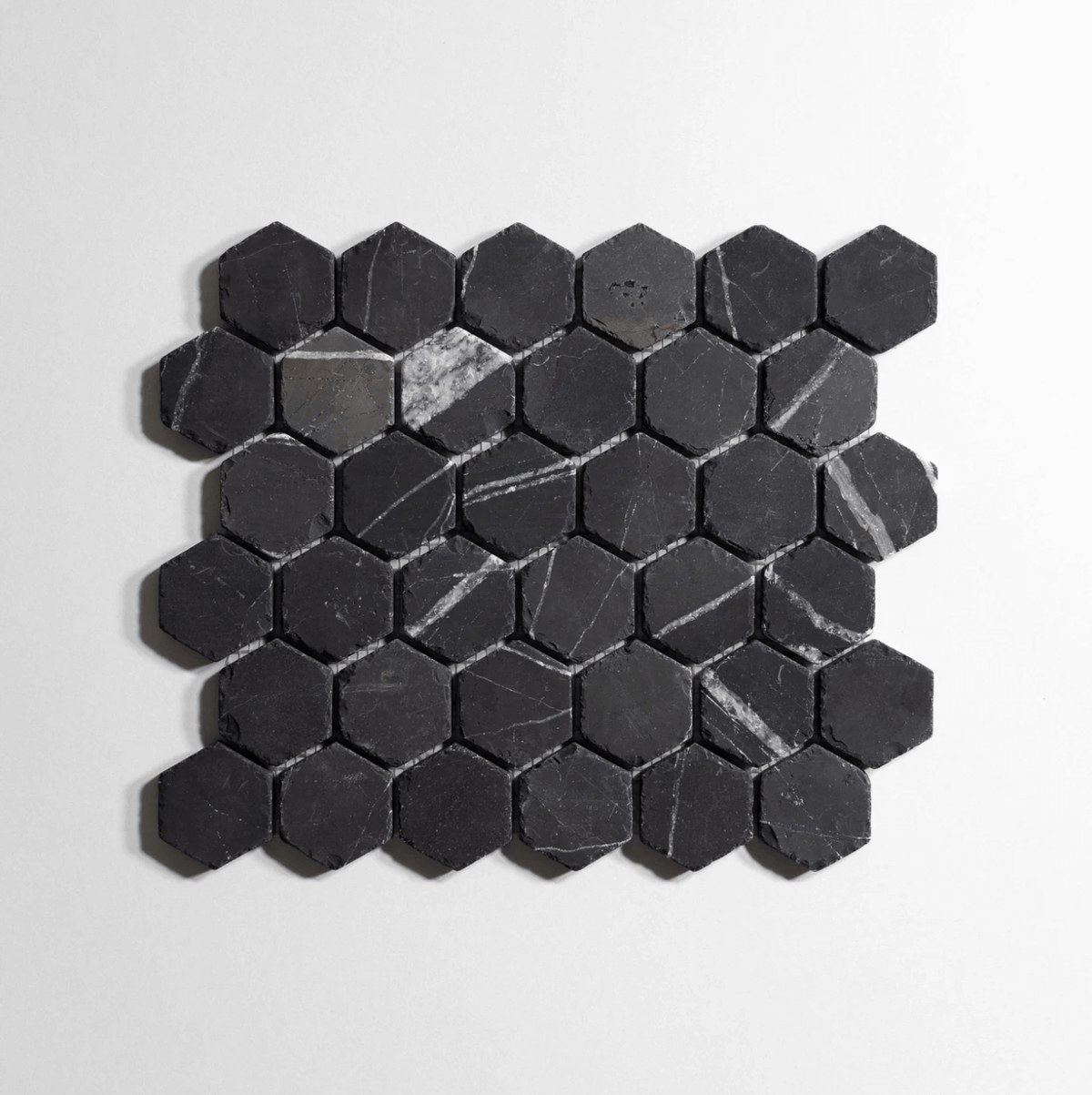 Nero St. Gabriel marble tile, hexagon shape, black with white veining