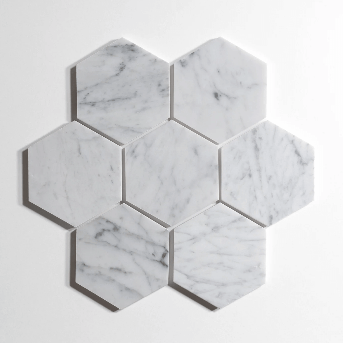 Venatino Carrara marble tile, hexagon shape, white with soft gray veining, 5 inch
