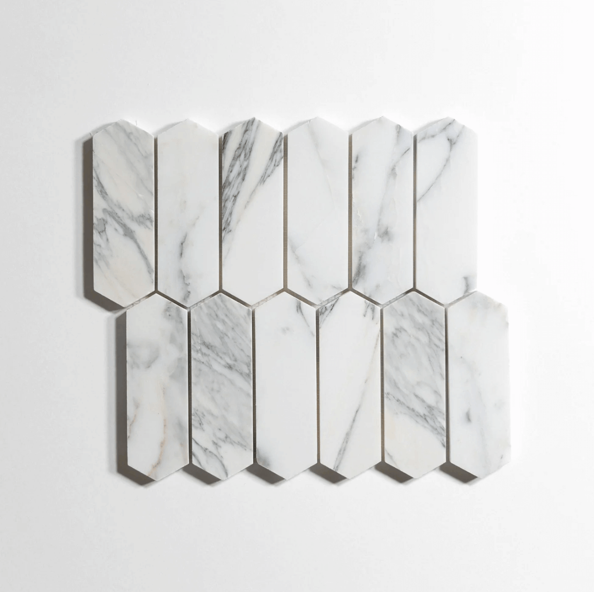 Calacatta marble tile, pickett mosaic pattern, white with dramatic gray veining