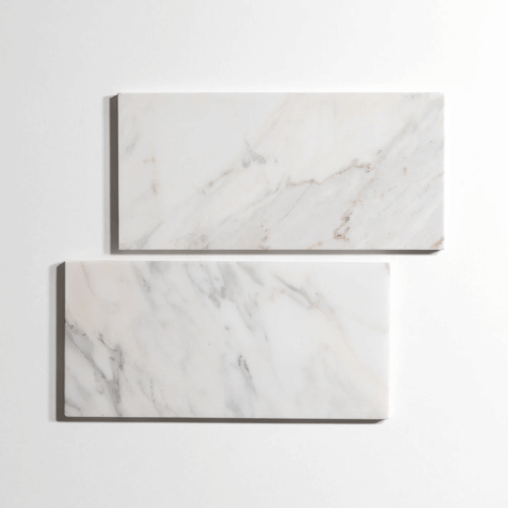 Calacatta marble tile, white with dramatic gray veining, 6x12 inch