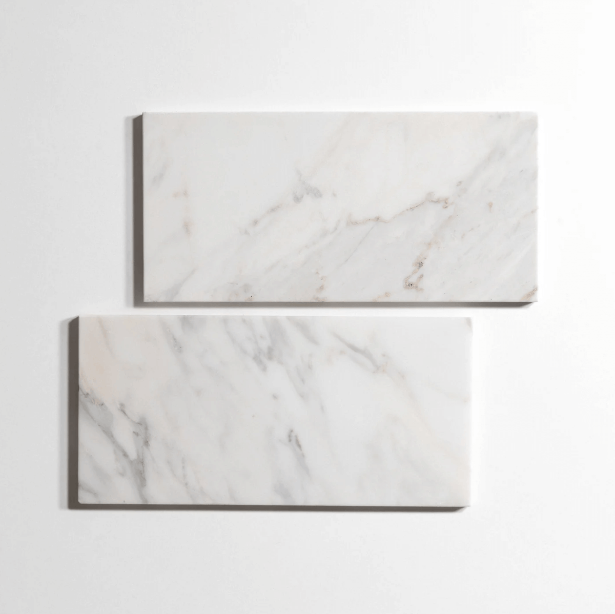 Calacatta marble tile, white with dramatic gray veining, 6x12 inch