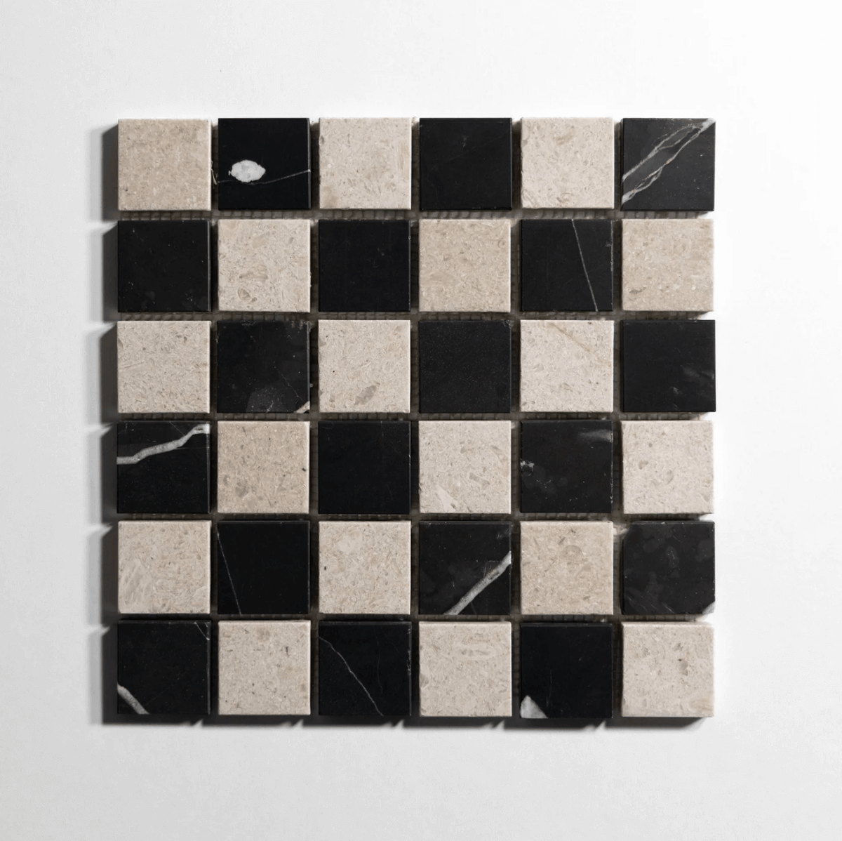Nero St. Gabriel and Sierra Limestone marble tile, mosaic, black with white veining and warm beige, 2x2 inch