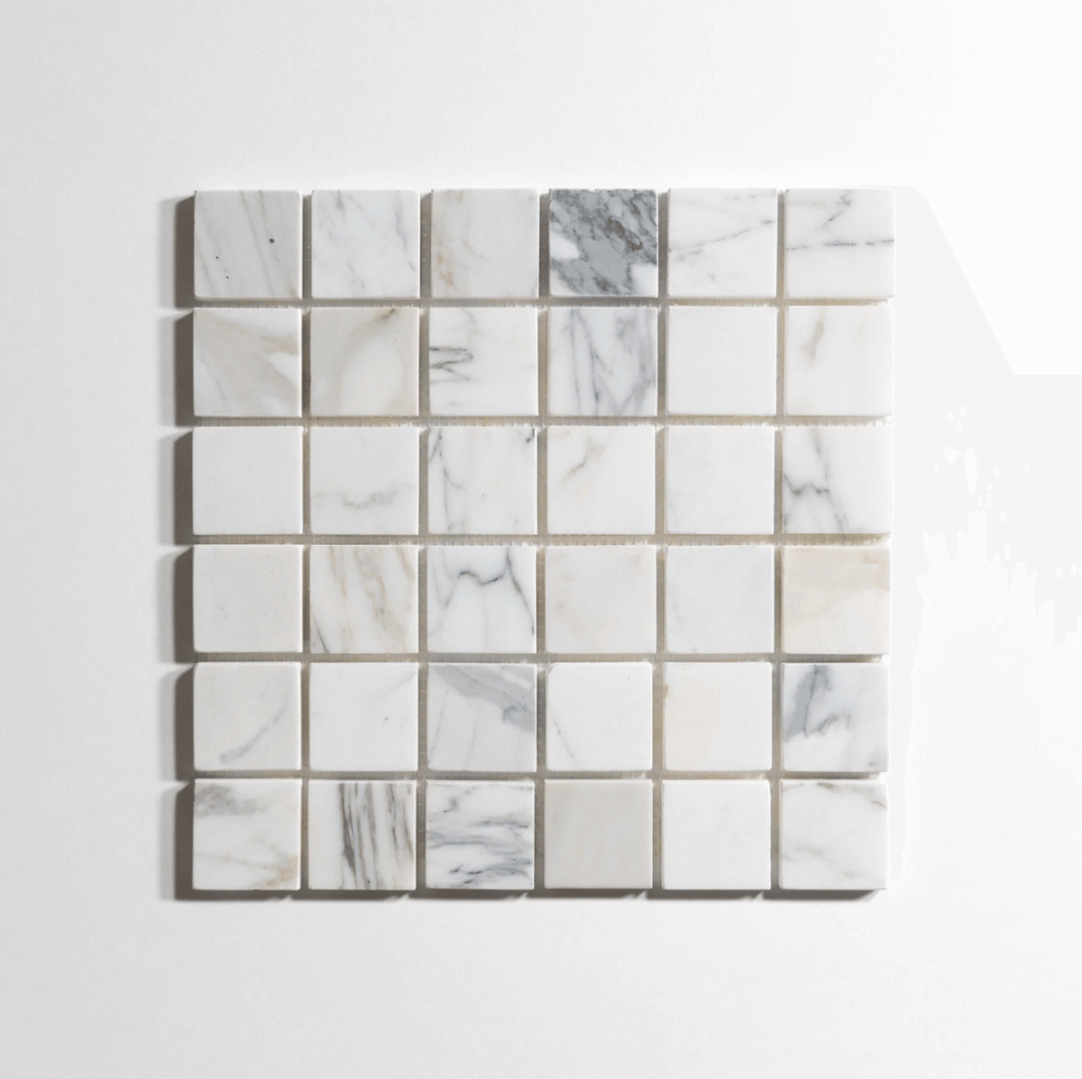 Calacatta marble tile, mosaic, white with dramatic gray veining, 2x2 inch