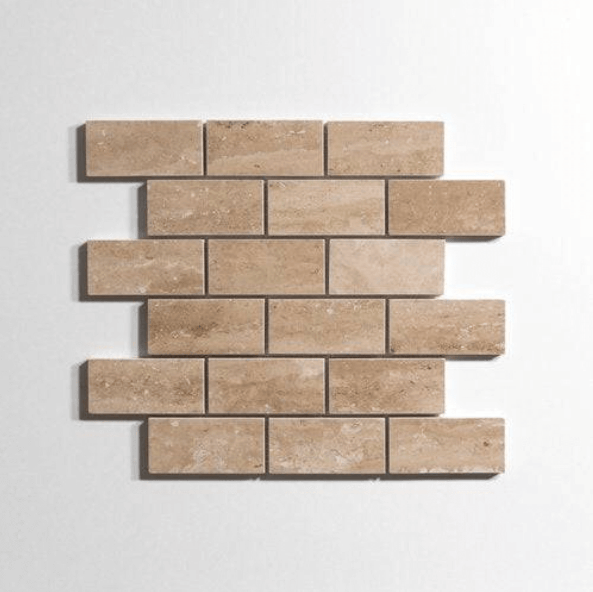 Durango Venato travertine tile, brick shape, beige with subtle veining, 2x4 inch