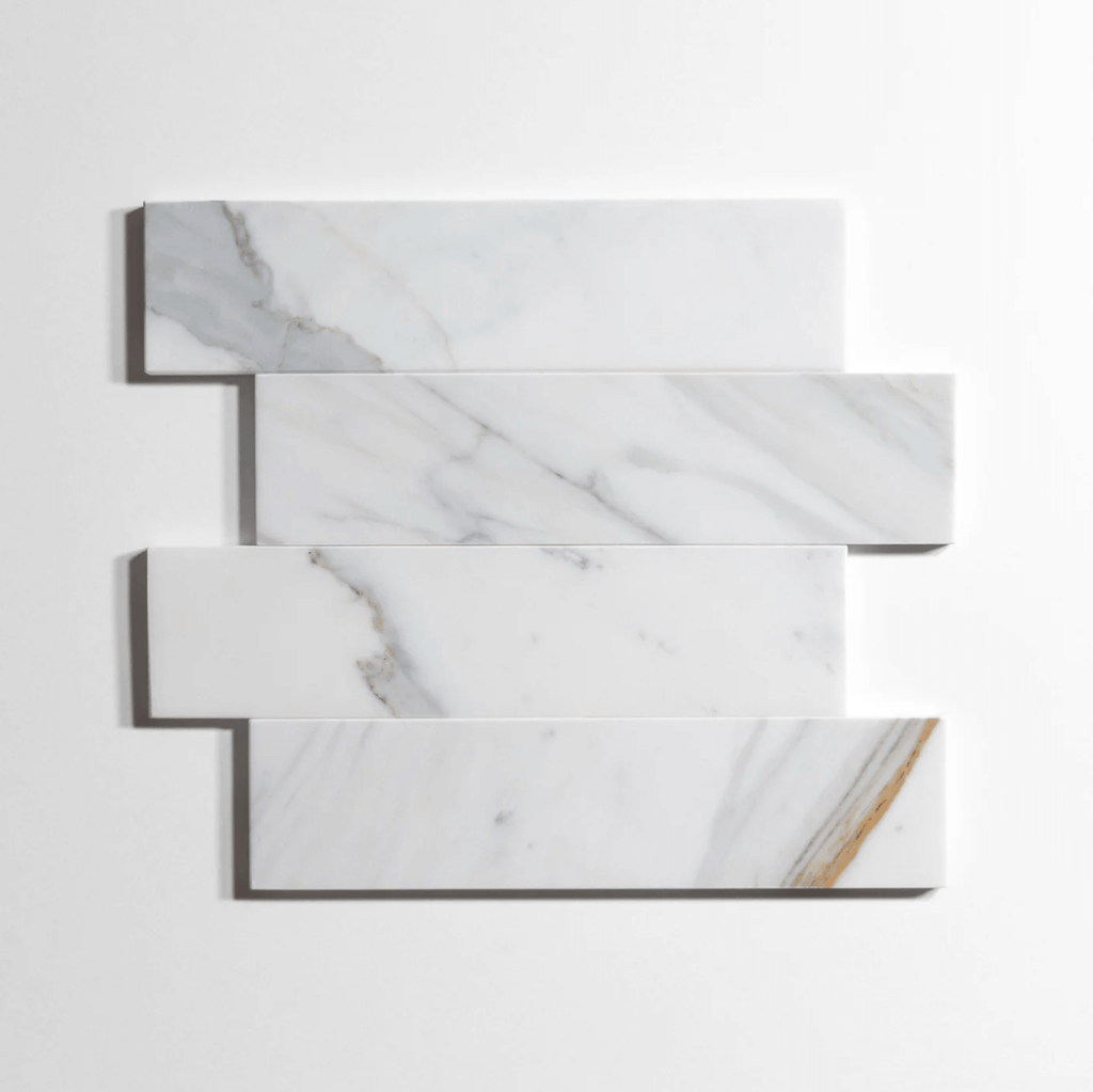 Calacatta marble tile, white with dramatic gray veining, 3x12 inch
