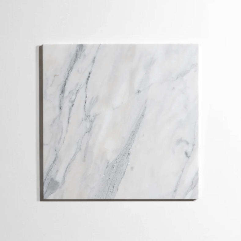 Calacatta marble tile, white with dramatic gray veining, 12x12 inch