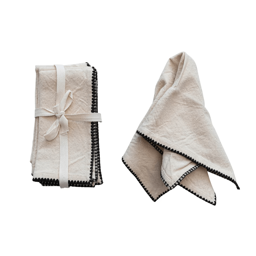 Calle square cotton napkins with black trim