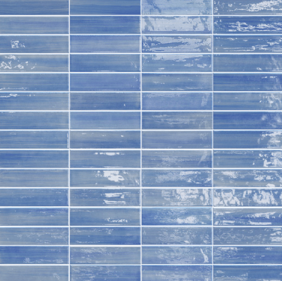 Vietri-inspired Dolcevita 2.5" x 10" blue tile collection showcasing elegant craquelure effects and traditional patterns.