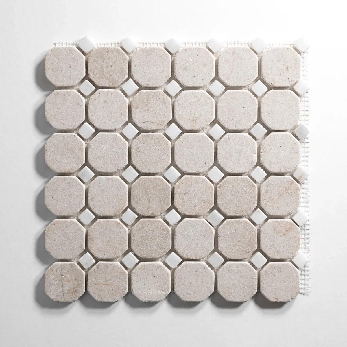 Sierra Limestone and Colorado Calacatta tile, octagon shape, warm beige and white with warm gold-gray veining