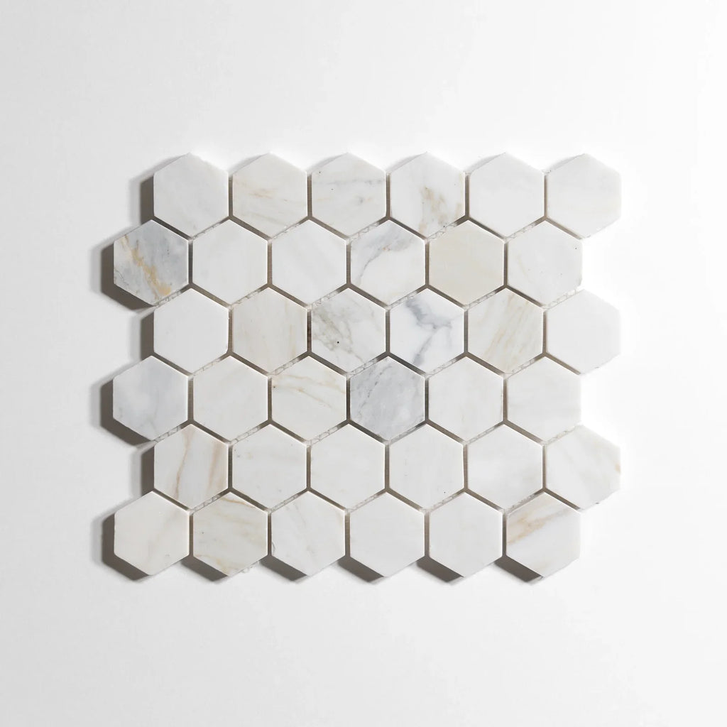 Calacatta marble tile, hexagon shape, white with dramatic gray veining